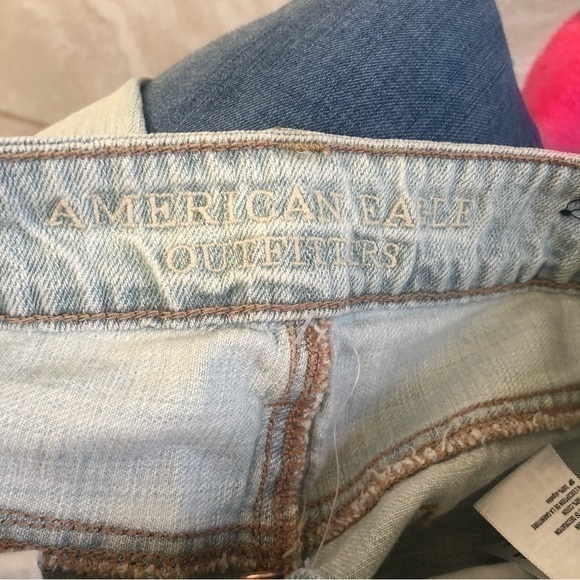 American Eagle TomGirl Super Distressed Light Blue Jeans Size 0 - Picture 8 of 12